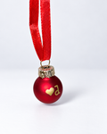 Tiny handmade matte red glass Christmas ornament with gold heart and letter d, red ribbon hanger